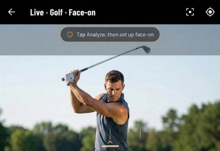 Llyr's live golf screen. A plain-language cue reading &ldquo;tap Analyze, then set up face-on&rdquo; sits over a golfer filmed face-on at the top of the backswing.