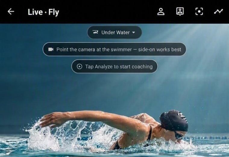 Llyr's live swim screen with a swimmer framed side-on through the surface and an on-screen hint reading point the camera at the swimmer.